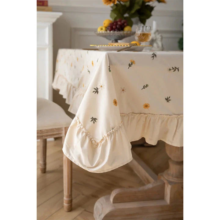 Elegant cotton tablecloth with apricot embroidery and lotus leaf edge, perfect for dining decor