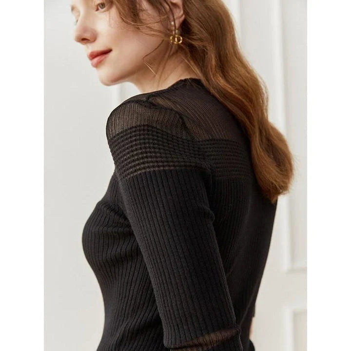 Elegant and comfortable women's half sleeve knitted top in black color with a stylish and sophisticated design
