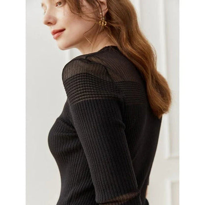 Elegant and comfortable women's half sleeve knitted top in black color with a stylish and sophisticated design