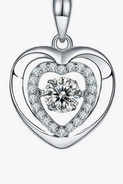 Captivating moissanite heart pendant necklace in sterling silver with a 0.5-carat center stone and sparkling accent stones