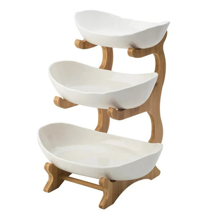 Three-tier plastic and bamboo fruit display tray with unique leaf-shaped design, available in white, beige, and green colors