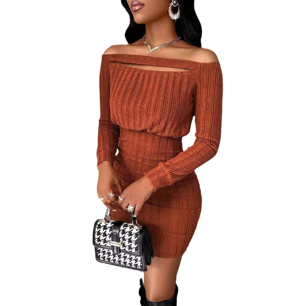 Alluring long sleeve midi dress in a solid brown color, featuring a sleek silhouette and nine-quarter sleeve length for sophisticated style.