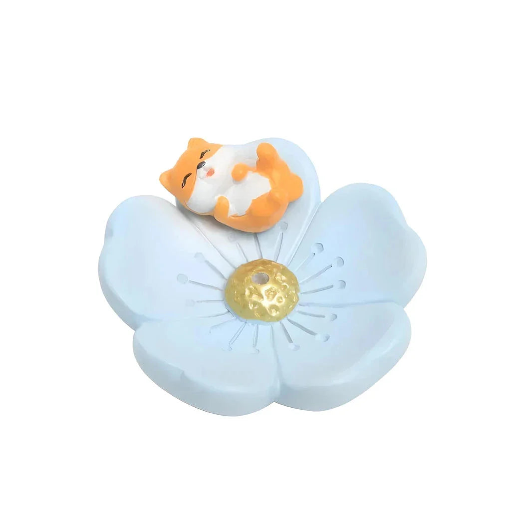 Elegant mini resin incense holder with cherry blossom, water lily, plum blossom, and daisy motifs for calming aromatherapy experience