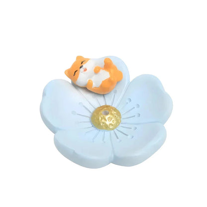 Elegant mini resin incense holder with cherry blossom, water lily, plum blossom, and daisy motifs for calming aromatherapy experience