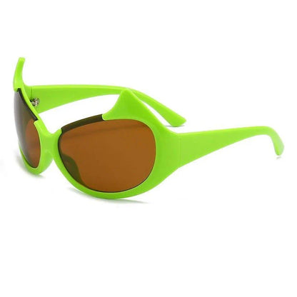Stylish cat-eye sunglasses with oversized frames, semi-rimless design, and punk-inspired detailing for a timeless, glamorous look