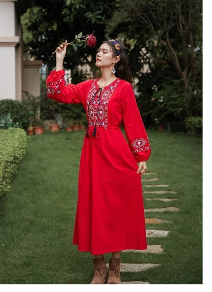 Elegant embroidered cotton-linen dress with tassels, featuring a waist-cinching A-line silhouette in vibrant colors