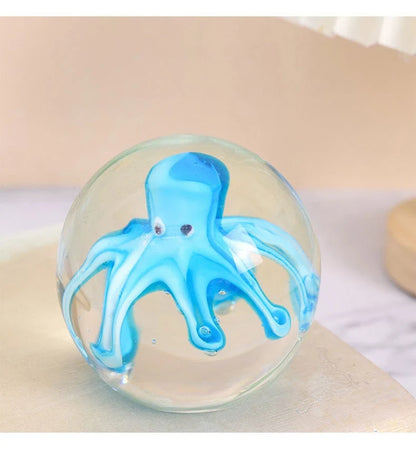 Handcrafted glass octopus decoration for windshield washer fluid, available in ocean blue and tea brown colors