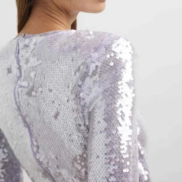 Glamorous purple sequin mini dress with O-neck neckline and long sleeves for a stylish and comfortable cocktail party look