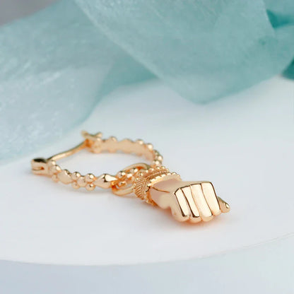 Premium gold-plated hand guard and elegant eardrop set with geometric design