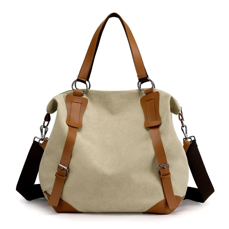 Versatile canvas shoulder bag in khaki color with multiple pockets and adjustable strap for everyday use