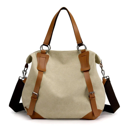 Versatile canvas shoulder bag in khaki color with multiple pockets and adjustable strap for everyday use