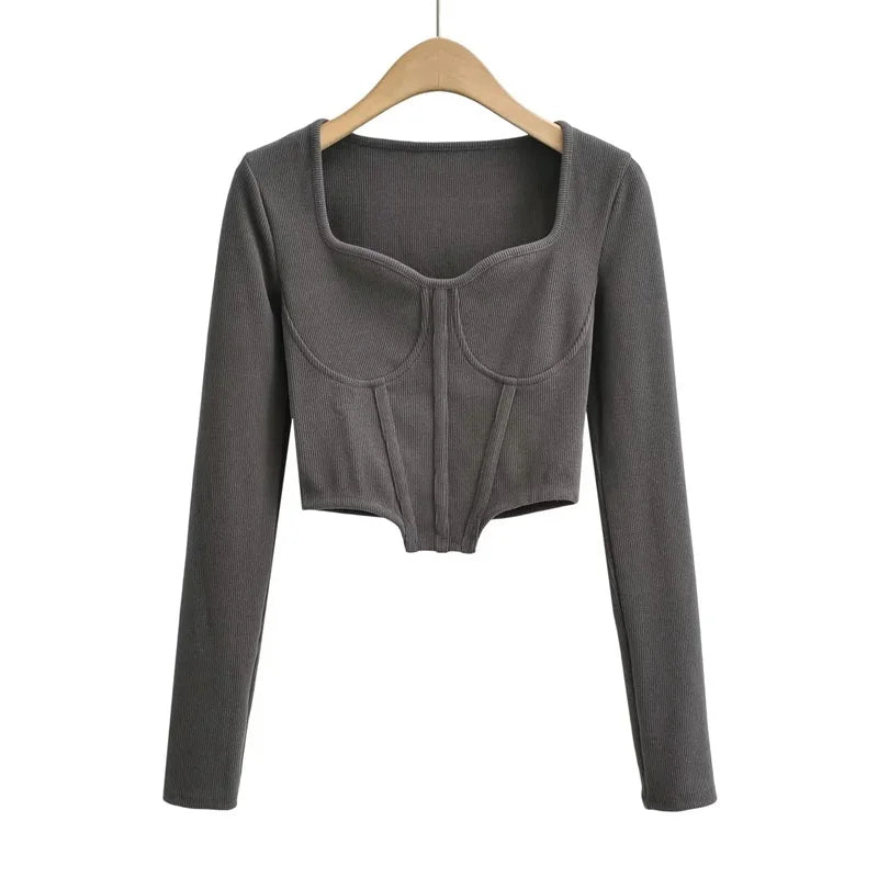 A stylish slim-fit short autumn top with an open waist design, made of premium polyester fabric with long sleeves and a square collar.