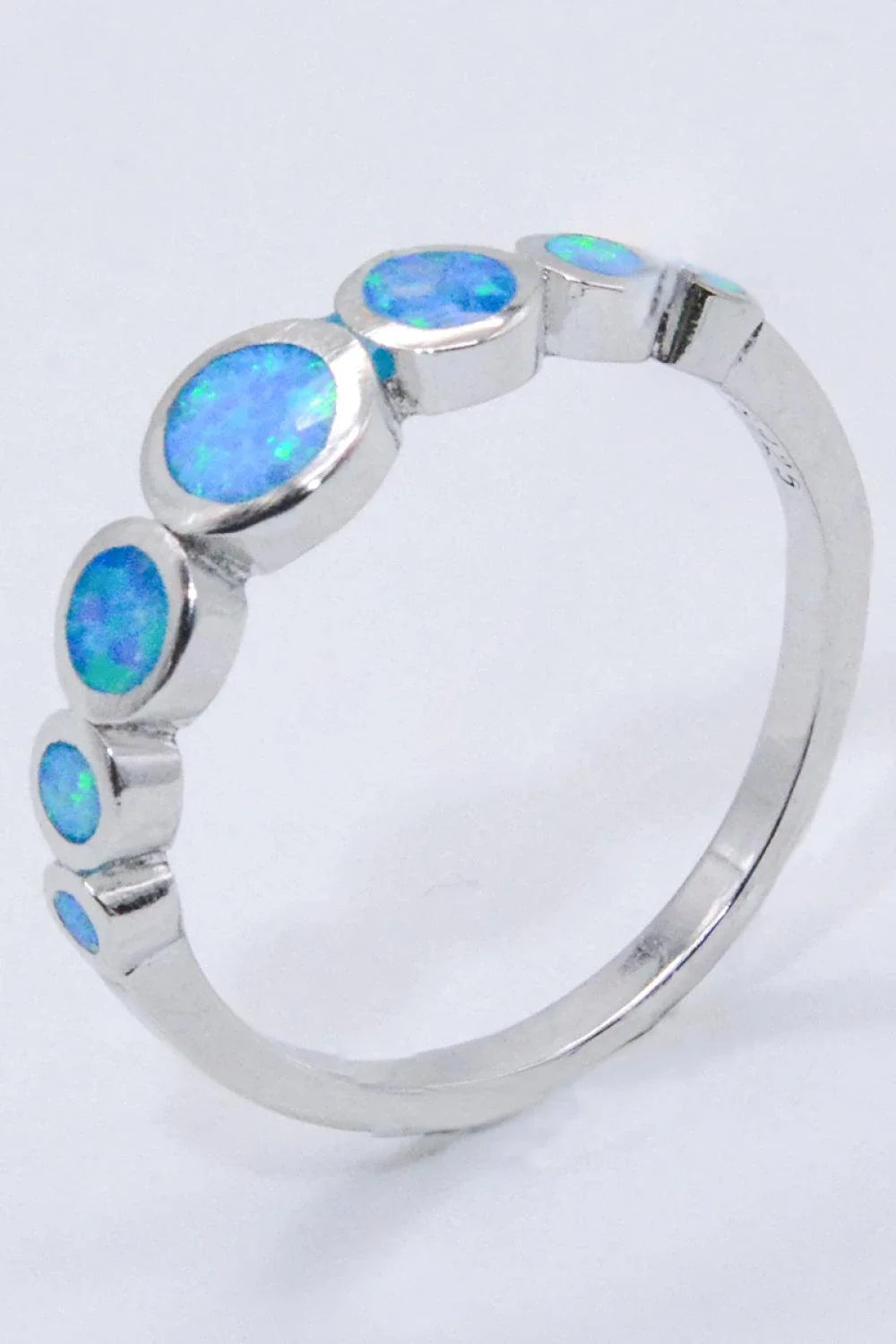 Elegant 925 Sterling Silver Ring with Sparkling Opal Gemstones in a Minimalist Design