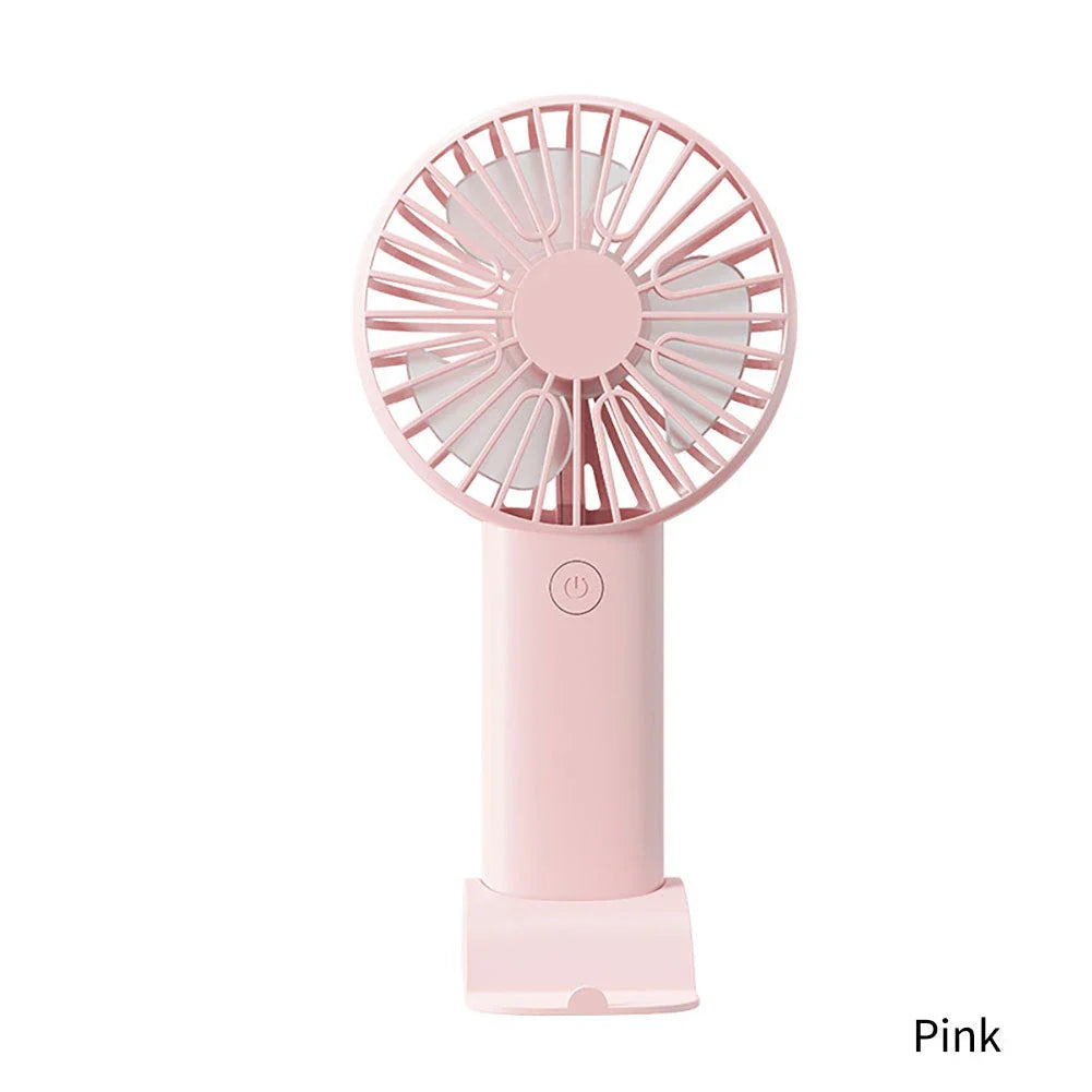 Compact USB Rechargeable Mini Handheld Fan with 3 wind modes, desktop stand, and phone holder for cooling anywhere