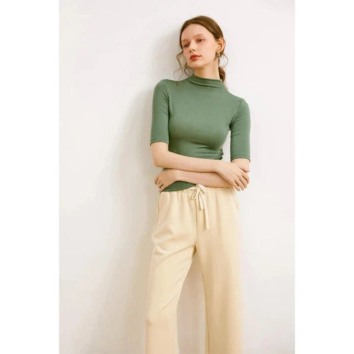 Women's Mock Neck Wool Blend T-Shirt in Pink by Trendha, featuring a sleek silhouette and classic design for elegant, comfortable wear.