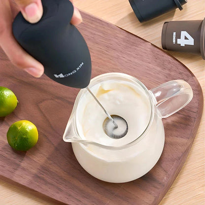 Portable electric milk frother and blender with sleek, ergonomic design and stainless steel mixing head
