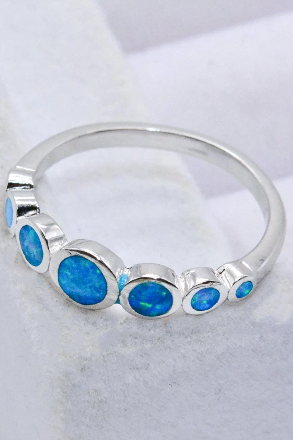 Elegant 925 Sterling Silver Ring with Sparkling Opal Gemstones in a Minimalist Design