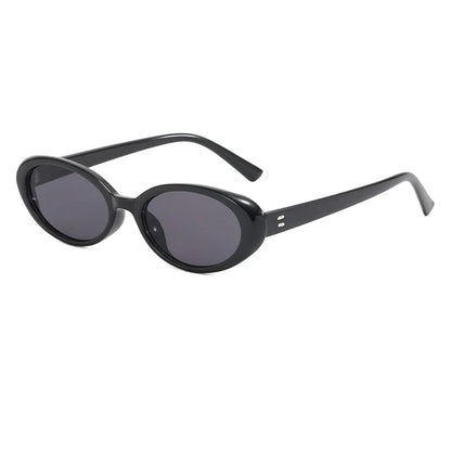 Chic oval sunglasses with white grey acetate frames and polycarbonate lenses, designed for fashionable women to shield their eyes from UV rays in style.