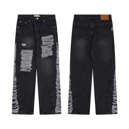 Premium loose fit distressed denim trousers for men and women, featuring a relaxed silhouette, high-quality cotton construction, and trendy distressed details.
