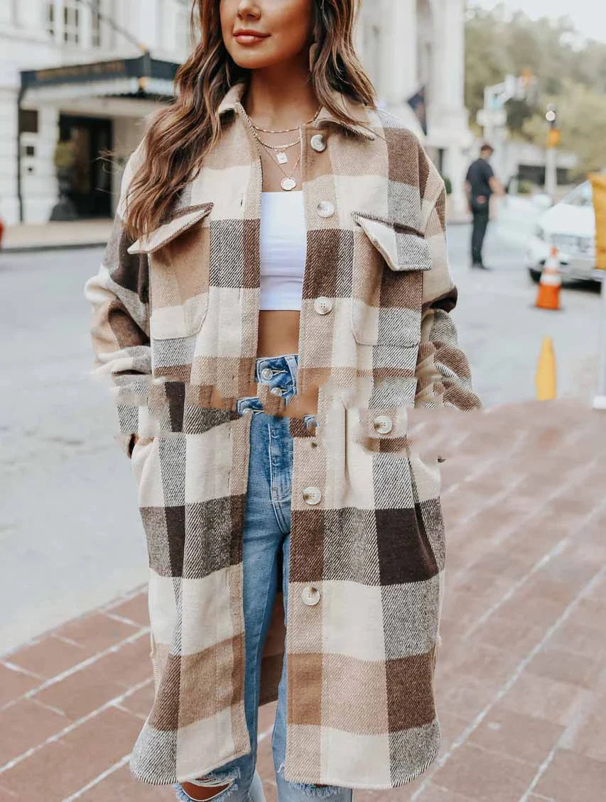 A fashionable women's plaid woolen jacket with a relaxed fit, featuring a timeless plaid pattern and polyester construction for comfort and durability.