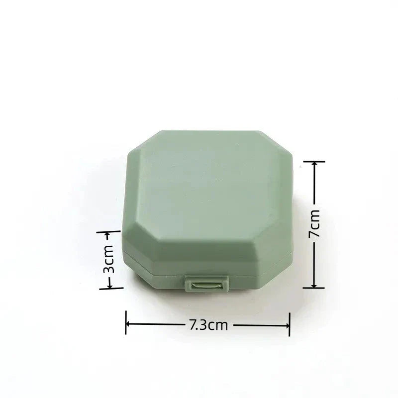 Compact Portable Pill Box with 6 Compartments for Organizing Medication on the Go