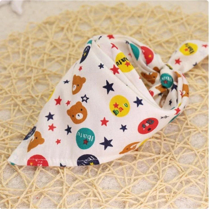 Adorable Cartoon Patterned Triangular Dog Scarf in vibrant colors, perfect for keeping your pup warm and stylish