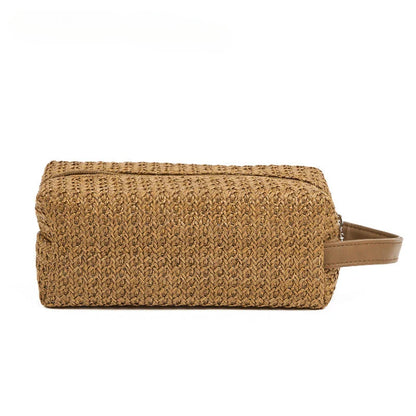 Elegant and Practical Cosmetic Bag made from high-quality straw material with a unique knitting pattern, providing ample storage and a stylish accessory for modern women.