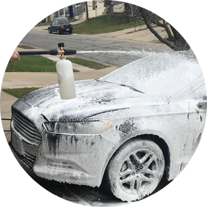 A compact, plastic car wash foam-generating tank with a copper connector to attach to a standard garden hose.