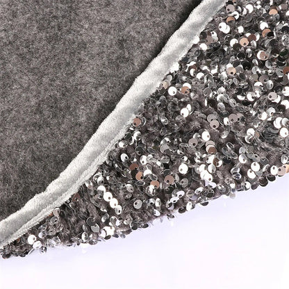Sparkling Christmas tree skirt with shimmering silver gray sequins, adding a touch of holiday magic to your home decor