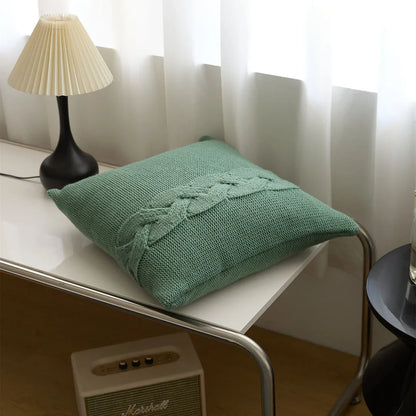 Cozy Nordic-inspired knit pillow cover with large twist design in multiple colors for stylish home decor