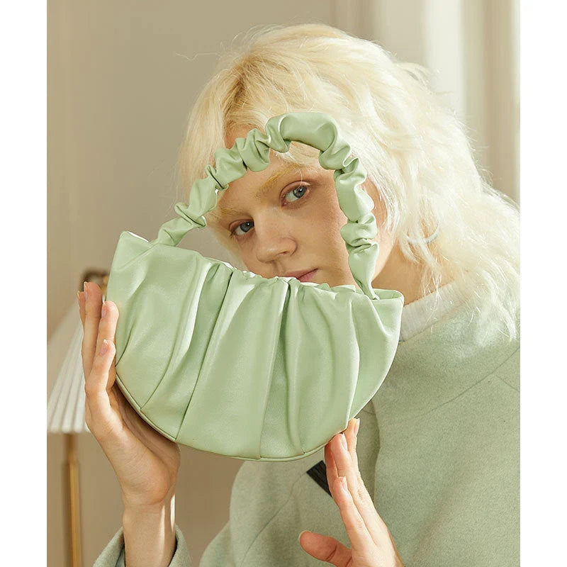 Luxurious Sheepskin Pleated Crossbody Bag in various colors - a stylish and functional everyday accessory for women