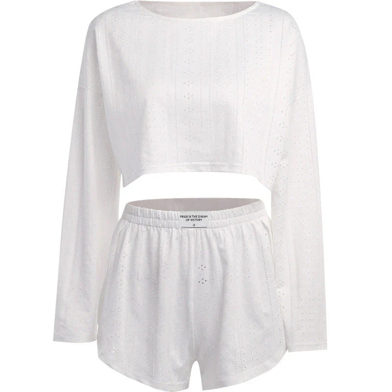 Trendha Women's Long Sleeve Pullover Top and Shorts Set in White, featuring a chic hollow-out design and flattering slim fit
