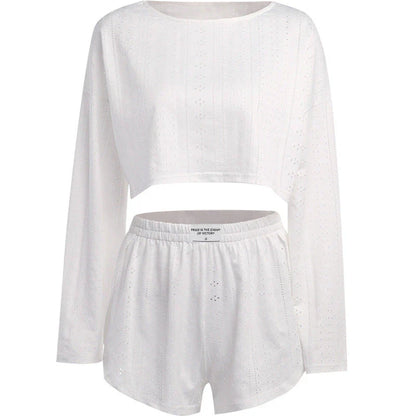 Trendha Women's Long Sleeve Pullover Top and Shorts Set in White, featuring a chic hollow-out design and flattering slim fit