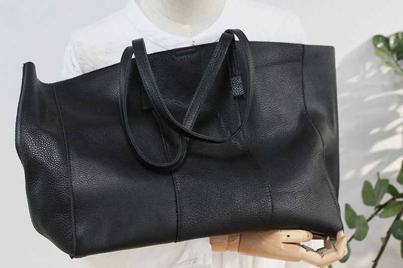 Premium leather handbag with multiple pockets and compartments for exceptional organization and style