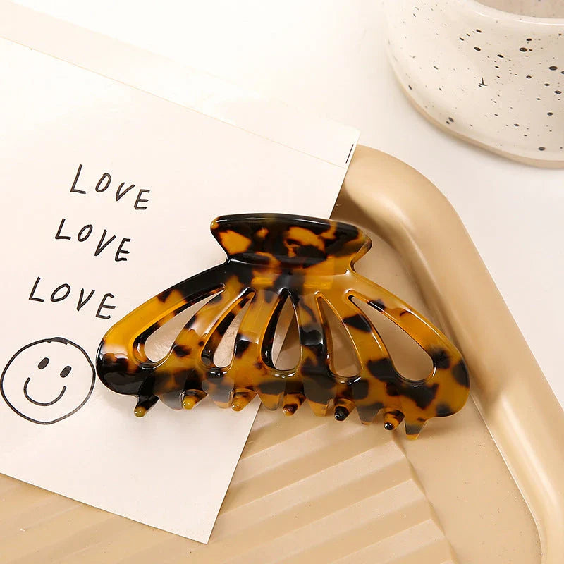 Stylish geometric hollow stripes hair barrettes in beige color, a fashionable accessory to elevate any hairstyle