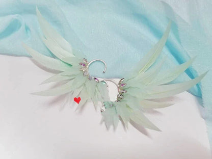 Elegant feather earrings with delicate angel wing design in various color options