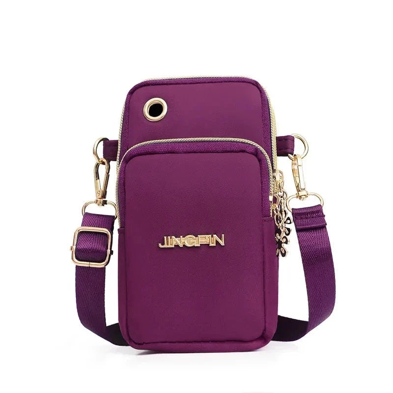 Fashionable women's crossbody phone bag with multi-function pockets, headphone plug, and stylish decorations