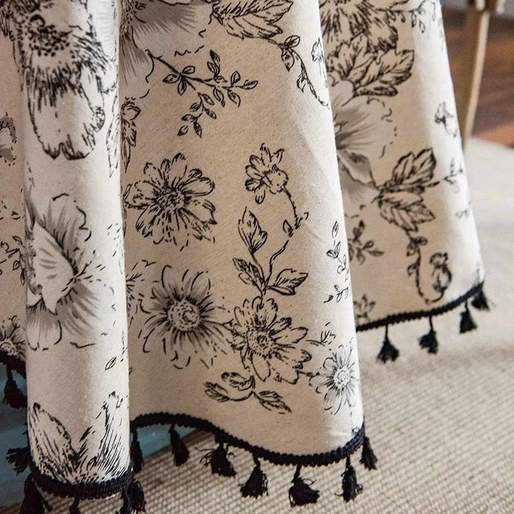 Elegant floral cotton linen round tablecloth with tassels, perfect for dining, kitchen, and home decor