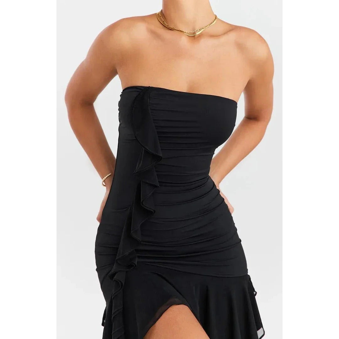 Elegant strapless ruffled mini dress in black featuring a bodycon silhouette and backless design for a chic, glamorous look.