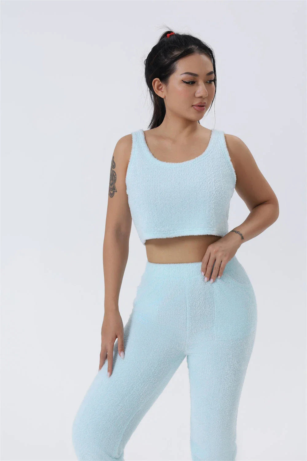 Cozy 3-piece loungewear set in pastel colors including crop top, wide-leg pants, and matching cardigan