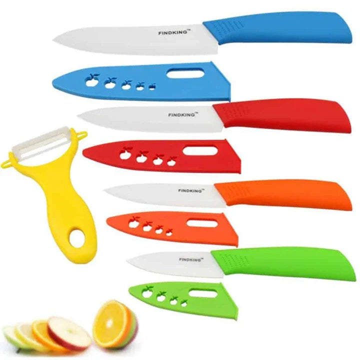 Vibrant ceramic knives in various colors, including red, blue, green, black, yellow, and orange, arranged on a white background.