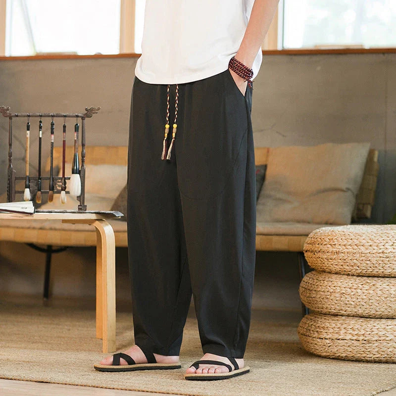 Men's Chinese-inspired harem pants made of luxurious ice silk fabric with a relaxed, draped silhouette