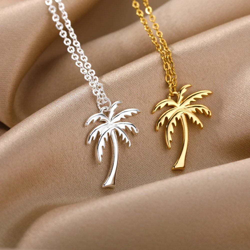 Stainless steel palm tree pendant necklace with sleek chain, perfect for summer beach style and bohemian fashion