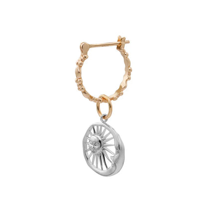 Elegant silver earrings with a geometric sun and moon design, perfect for adding a touch of celestial style to any outfit.