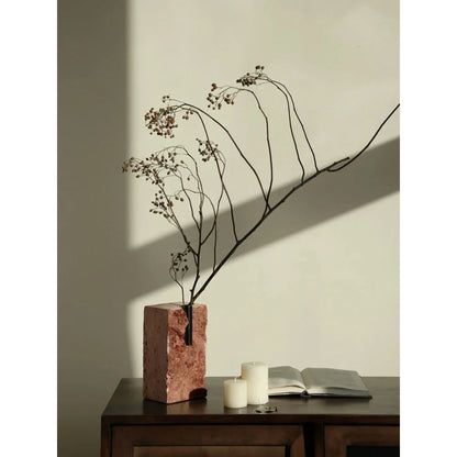 Elegant minimalist red travertine vase with natural stone texture and European-inspired design, perfect for rustic home decor