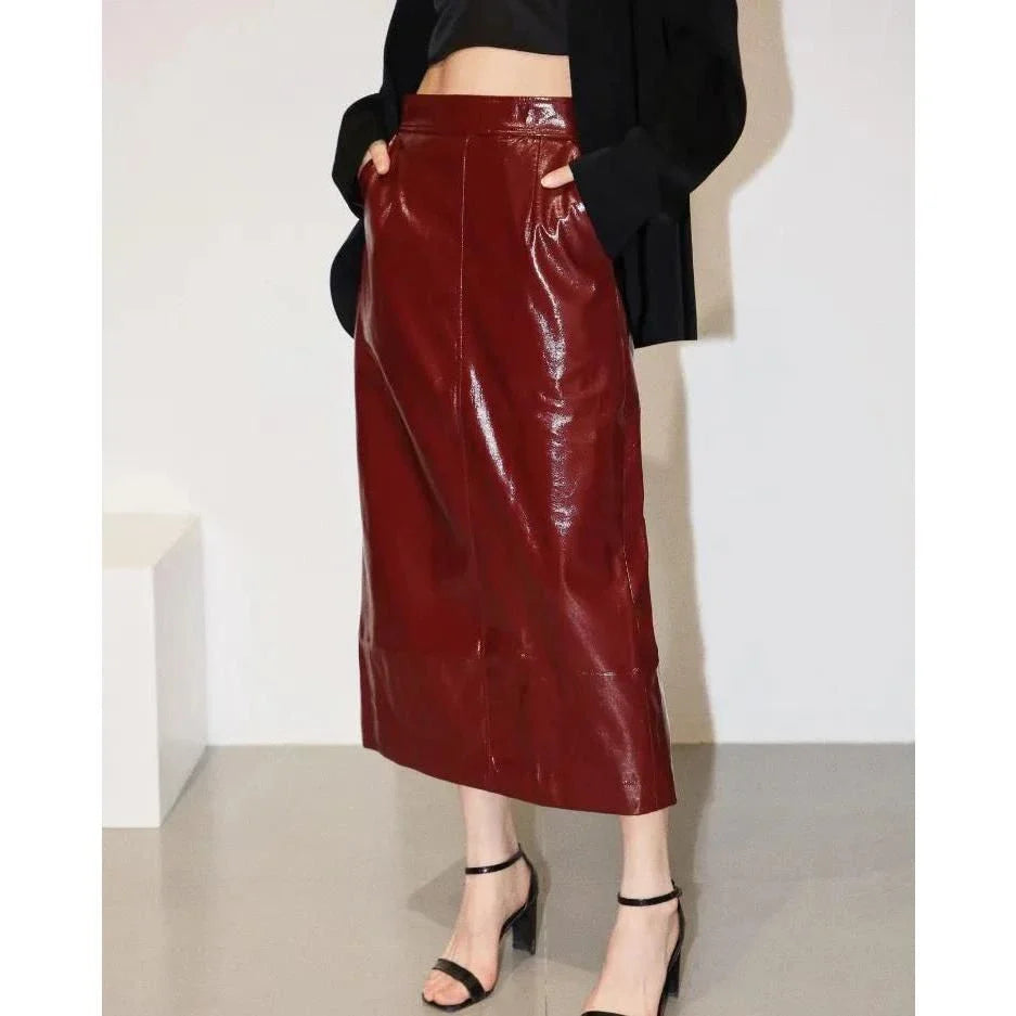 Reflective leather midi pencil skirt with a flattering high-waist design and eye-catching reflective material