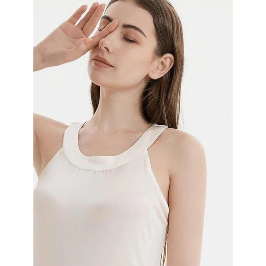 Elegant silk-blend halter neck midi dress in green and white colors, showcasing a chic and versatile design for modern American women.