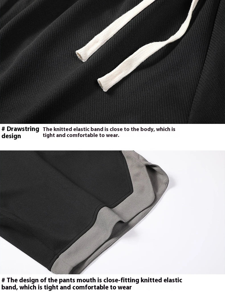 Men's loose and comfortable sports pirate shorts in white, gray, and black colors with elasticized waistband and relaxed fit