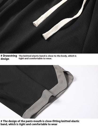 Men's loose and comfortable sports pirate shorts in white, gray, and black colors with elasticized waistband and relaxed fit