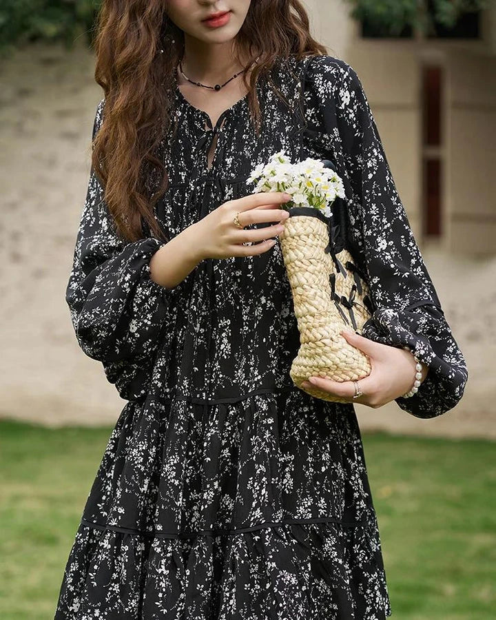 Floral print dress with flare sleeves, knee-length design, and loose, comfortable fit
